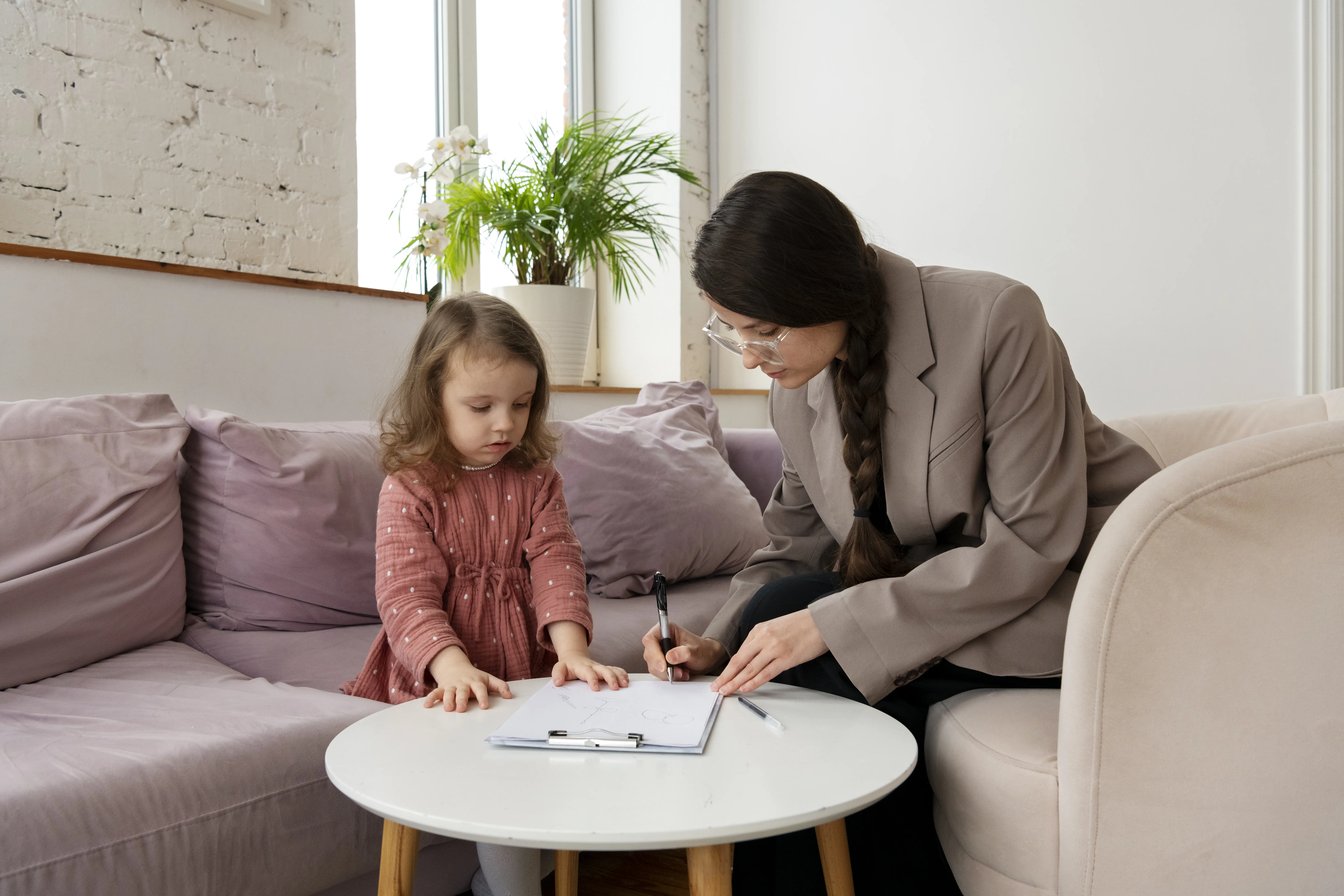 Parent meeting with child support attorney for free consultation