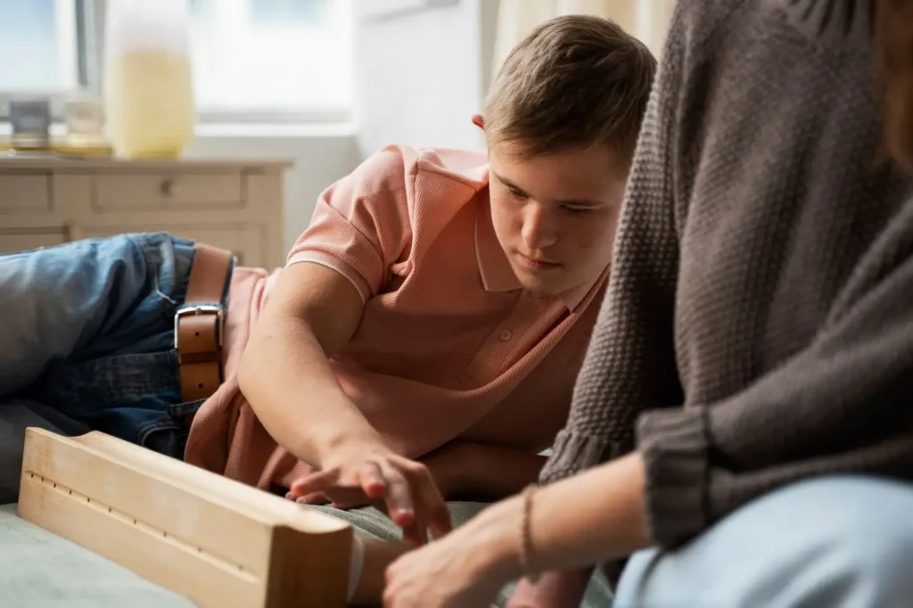 Teenager and parent assembling furniture together at home, showing cooperation, guidance, and shared responsibility.