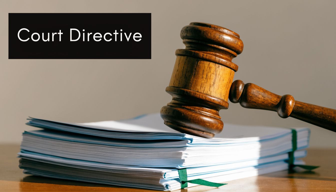 A wooden gavel resting on a stack of legal documents labeled with the text Court Directive.